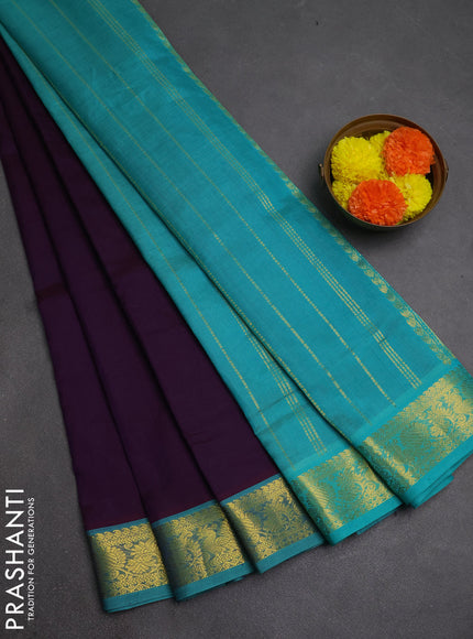 Silk cotton saree deep violet and teal blue with plain body and zari woven border