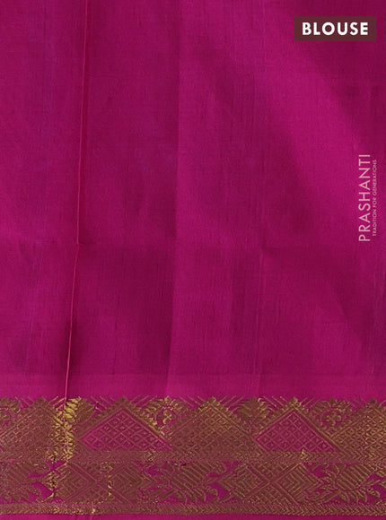 Silk cotton saree dual shade of bluish green and magenta pink with plain body and zari woven border