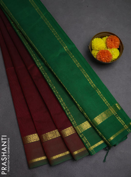 Silk cotton saree maroon and green with plain body and rettapet zari woven border