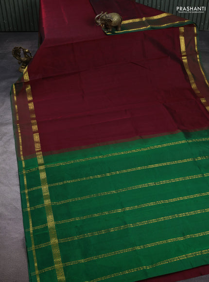 Silk cotton saree maroon and green with plain body and rettapet zari woven border