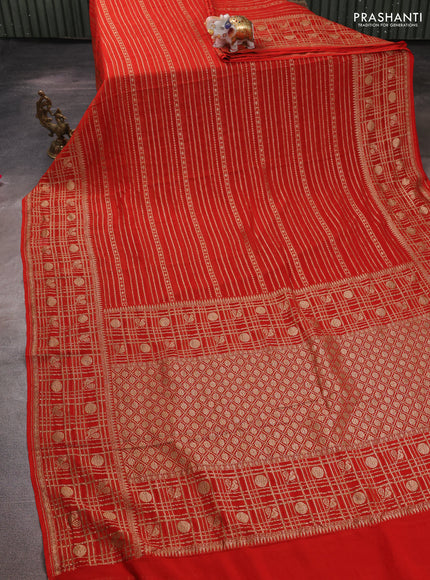 Banarasi georgette saree orange with allover thread & zari weaves and woven border