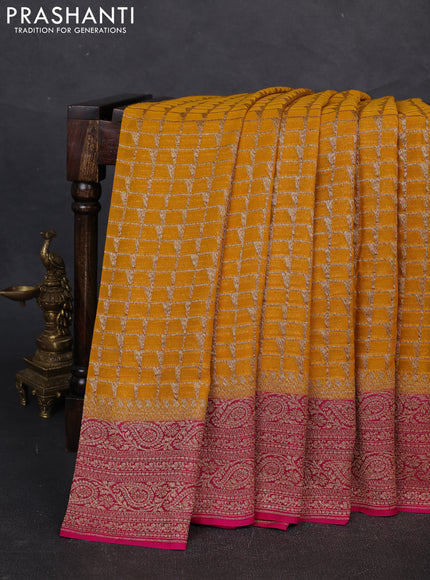 Banarasi georgette saree mustard yellow and pink with allover thread & zari checks buttas and woven border