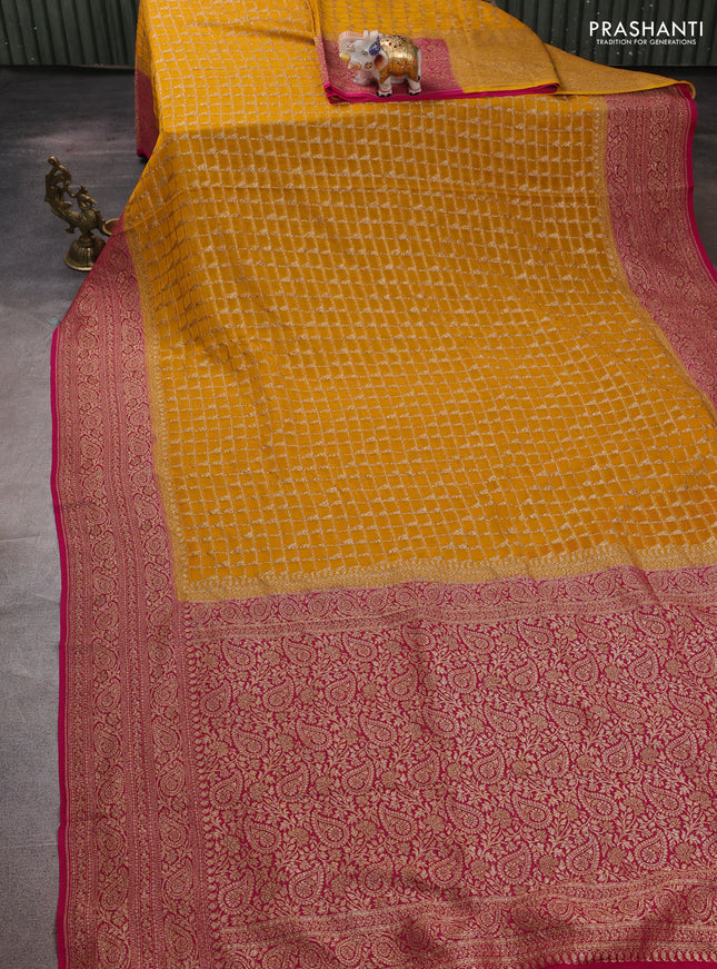 Banarasi georgette saree mustard yellow and pink with allover thread & zari checks buttas and woven border