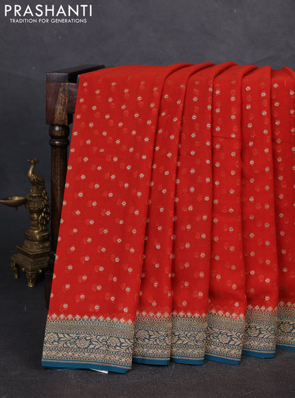 Banarasi georgette saree rust shade and peacock green with allover thread & zari woven buttas and woven border