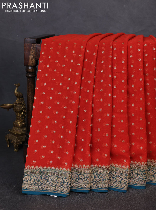 Banarasi georgette saree rust shade and peacock green with allover thread & zari woven buttas and woven border