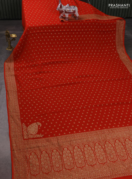 Banarasi georgette saree orange with allover thread & zari woven buttas and woven border