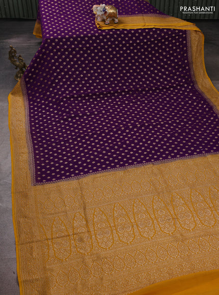Banarasi georgette saree violet and mustard yellow with allover thread & zari woven buttas and woven border