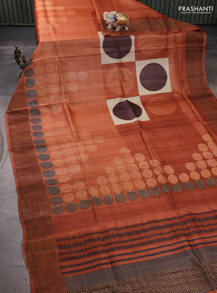 Pure tussar silk saree rust shade with allover geometric prints and zari woven border