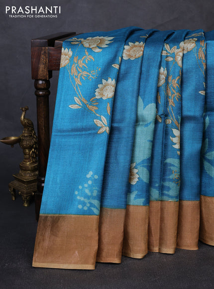 Pure tussar silk saree cs blue and sandal with floral prints and zari woven border