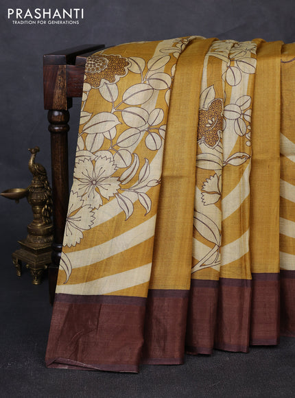 Pure tussar silk saree mustard yellow and brown with prints and zari woven border