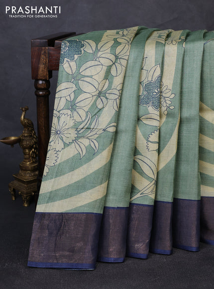 Pure tussar silk saree pastel green and blue with prints and zari woven border