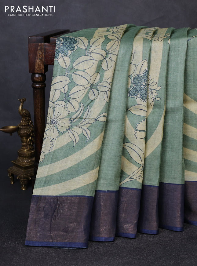 Pure tussar silk saree pastel green and blue with prints and zari woven border