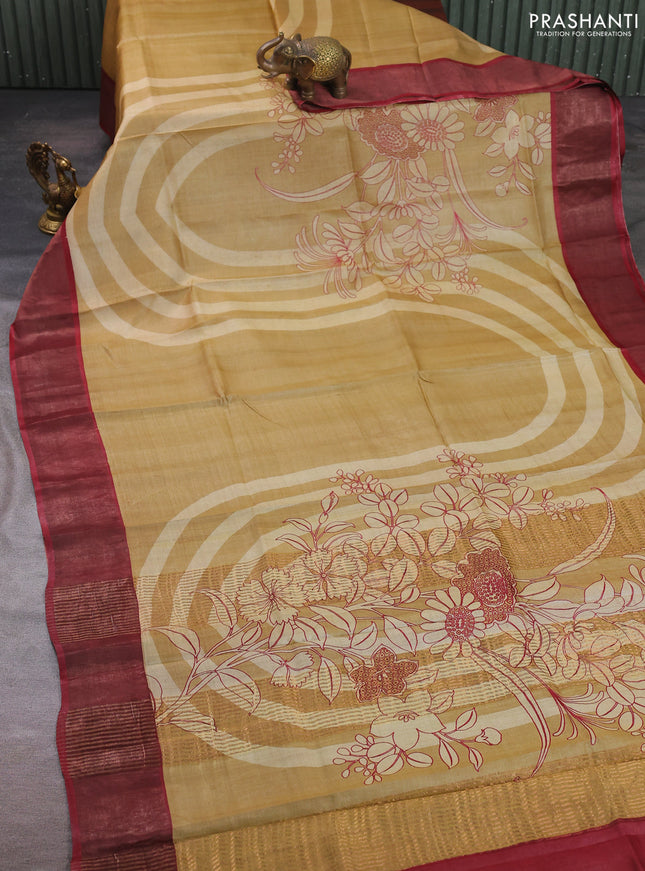 Pure tussar silk saree sandal and maroon with prints and zari woven border