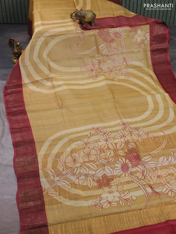 Pure tussar silk saree sandal and maroon with prints and zari woven border