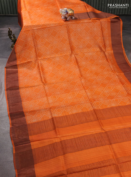 Pure tussar silk saree orange with allover bandhani prints and zari woven border