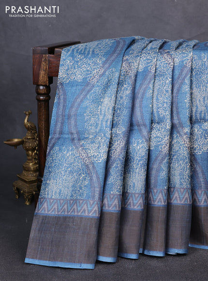 Pure tussar silk saree cs blue with allover prints and zari woven border