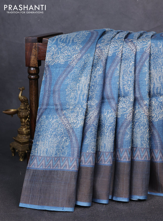 Pure tussar silk saree cs blue with allover prints and zari woven border