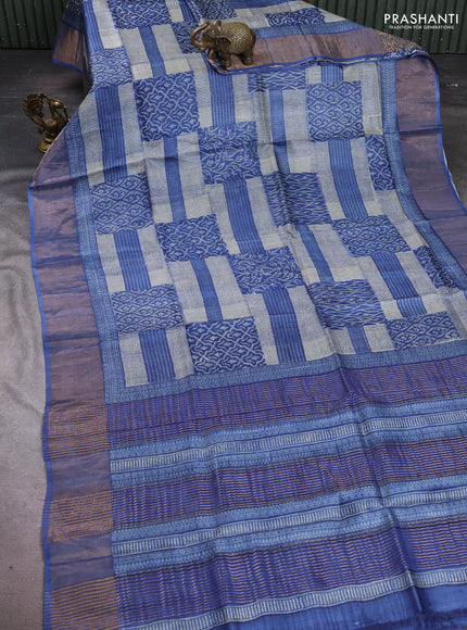 Pure tussar silk saree cream and blue with allover prints and zari woven border