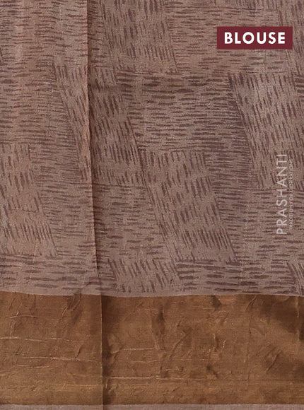 Pure tussar silk saree brown and pastel brown with floral prints and zari woven border