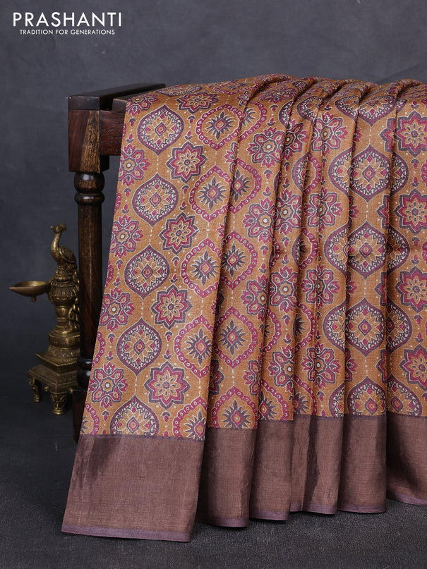 Pure tussar silk saree dark mustard and brown with allover ajrakh prints and zari woven border