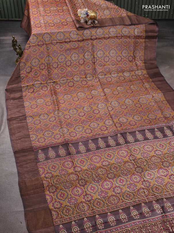 Pure tussar silk saree dark mustard and brown with allover ajrakh prints and zari woven border