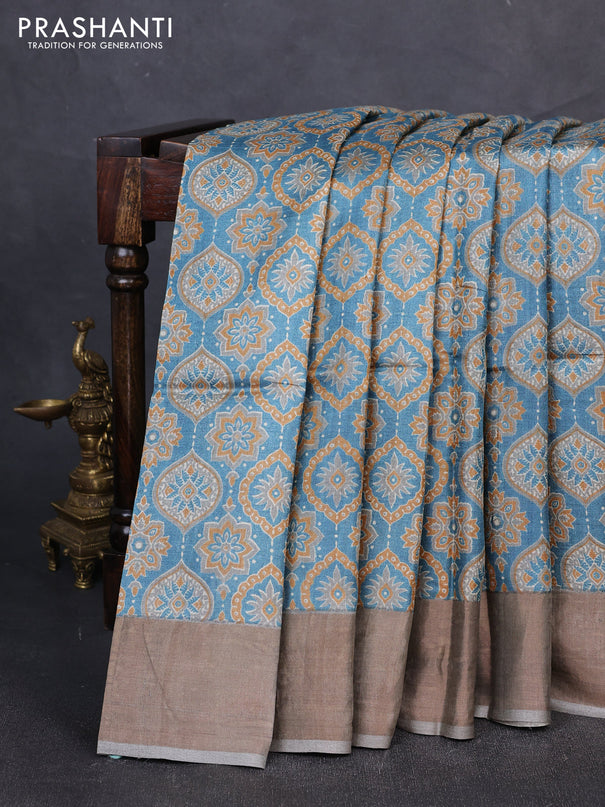 Pure tussar silk saree pastel blue and grey with allover ajrakh prints and zari woven border