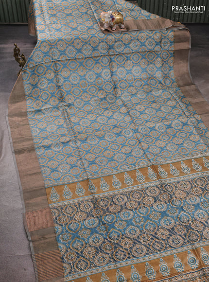 Pure tussar silk saree pastel blue and grey with allover ajrakh prints and zari woven border