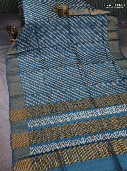 Pure tussar silk saree peacock blue with allover leheriya prints and zari woven border