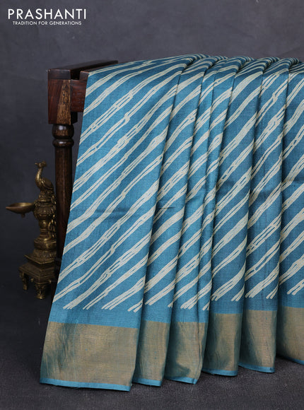 Pure tussar silk saree peacock blue shade with allover leheriya prints and zari woven border