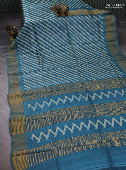 Pure tussar silk saree peacock blue shade with allover leheriya prints and zari woven border
