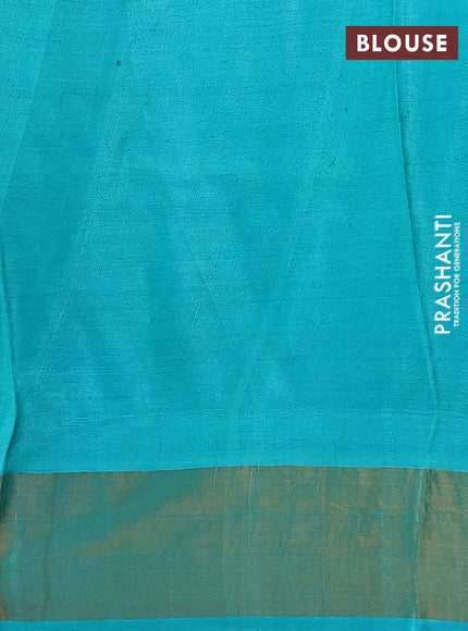 Pure tussar silk saree teal blue with allover leaf prints and zari woven border