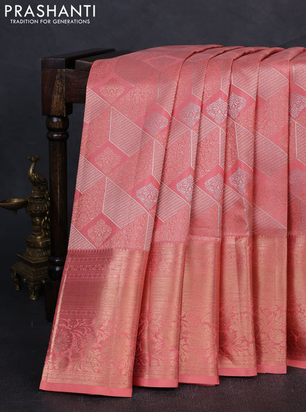 Pure kanchipuram silk saree peach orange with allover zari woven brocade weaves and long rich zari woven border