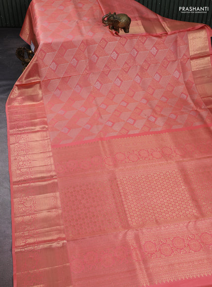 Pure kanchipuram silk saree peach orange with allover zari woven brocade weaves and long rich zari woven border
