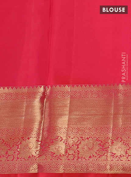 Pure kanchipuram silk saree dual shade of pinkish orange with allover zari woven brocade weaves and rich zari woven border