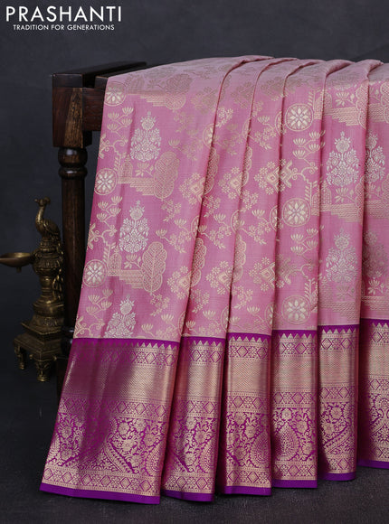 Pure kanchipuram silk saree pastel pink and purple with allover zari woven brocade weaves and rich zari woven border