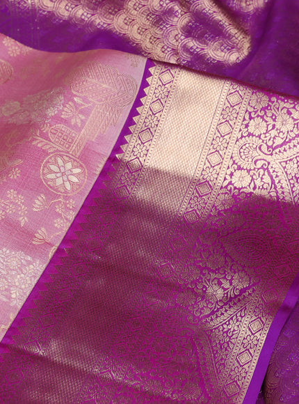 Pure kanchipuram silk saree pastel pink and purple with allover zari woven brocade weaves and rich zari woven border