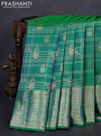 Pure kanchipuram silk saree dual shade of teal bluish green with allover zari woven brocade weaves and rich zari woven border