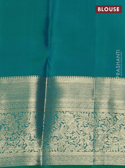 Pure kanchipuram silk saree dual shade of teal bluish green with allover zari woven brocade weaves and rich zari woven border