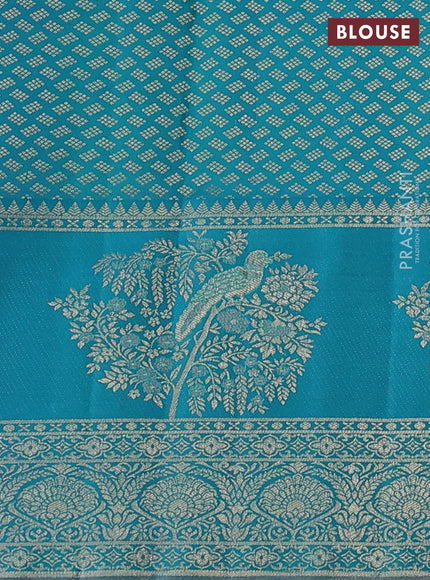 Pure kanchipuram silk saree teal green and cs blue with allover zari woven brocade weaves and long rich zari woven border