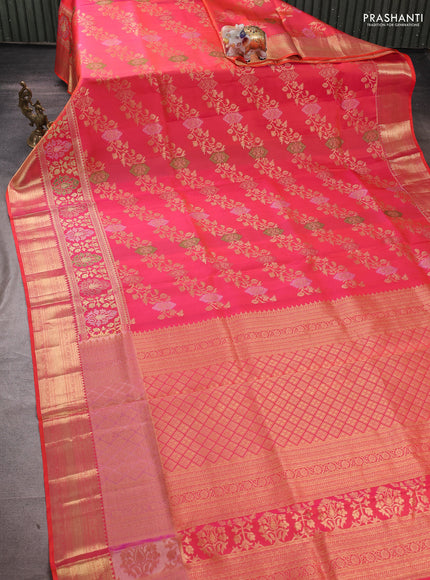 Pure kanchipuram silk saree dual shade of pinkish orange with allover zari woven brocade weaves and rich zari woven border