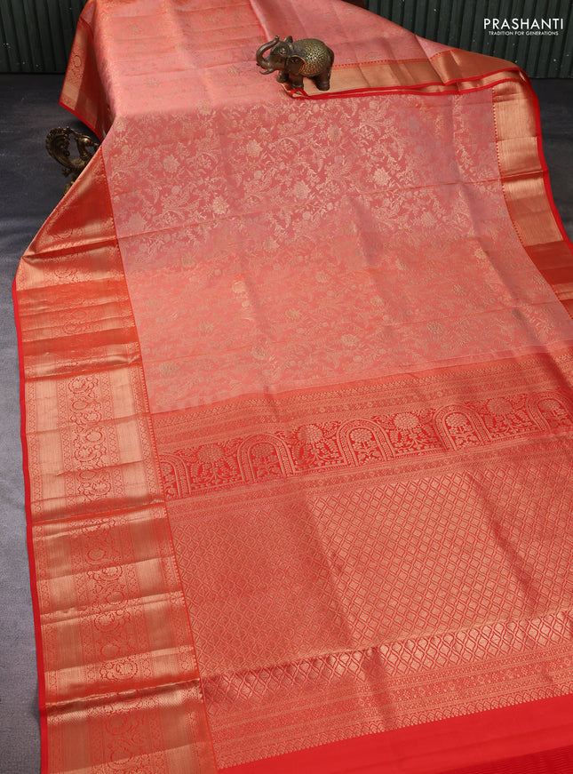 Pure kanchipuram silk saree peach orange and orange with allover zari woven brocade weaves and long rich zari woven border