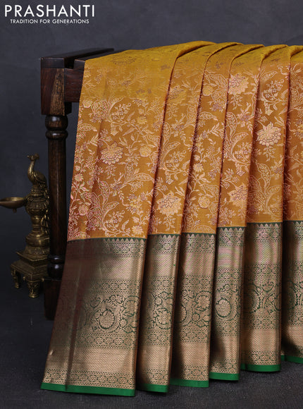 Pure kanchipuram silk saree dark mustard and green with allover zari woven brocade weaves and long rich zari woven border