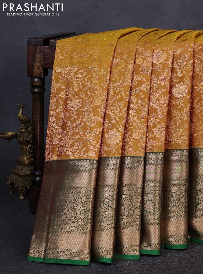 Pure kanchipuram silk saree dark mustard and green with allover zari woven brocade weaves and long rich zari woven border
