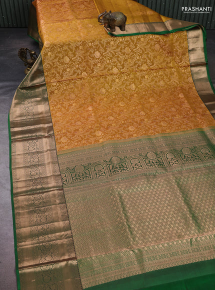 Pure kanchipuram silk saree dark mustard and green with allover zari woven brocade weaves and long rich zari woven border