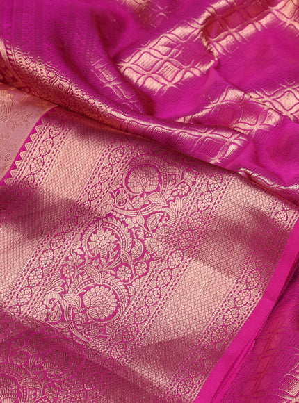 Pure kanchipuram silk saree pastel peach and magenta pink with allover zari woven brocade weaves and long rich zari woven border