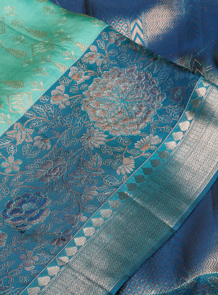 Pure kanchipuram silk saree teal green shade and peacock green with allover zari woven brocade weaves and rich floral zari woven border