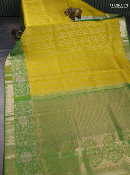 Pure kanchipuram silk saree lime yellow and green with allover zari woven brocade weaves and rich floral zari woven border