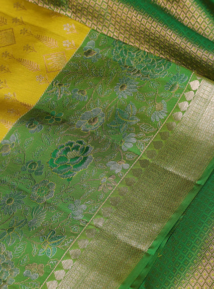 Pure kanchipuram silk saree lime yellow and green with allover zari woven brocade weaves and rich floral zari woven border