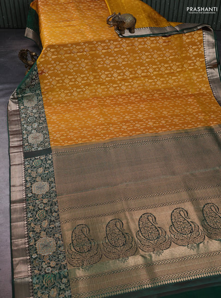 Pure kanchipuram silk saree dark mustard and bottle green with allover zari woven brocade weaves and rich floral zari woven border
