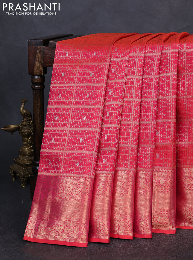 Pure kanchipuram silk saree dual shade of pinkish orange with allover zari woven brocade weaves and rich zari woven border